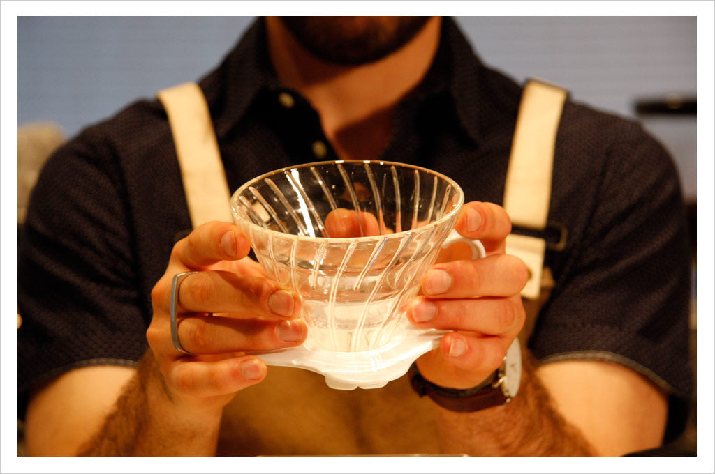 Man holding a Hario v60 brewer