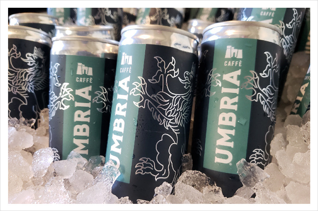 cans of nitro cold brew on ice