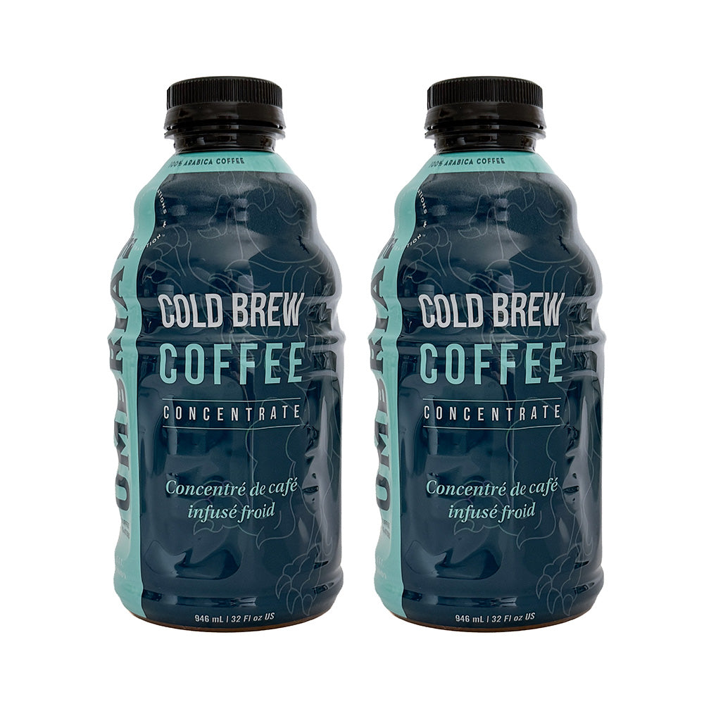 two 32 oz bottles of caffe umbria cold brew concentrate with blue logo wrap
