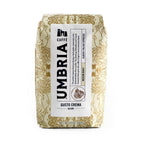 Gusto Crema blend cream colored bag with gold design